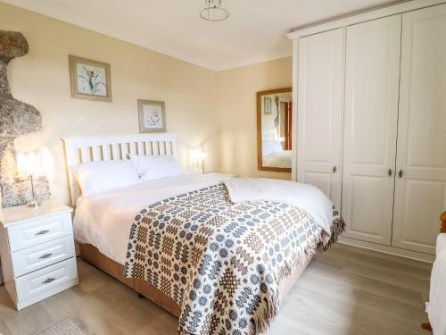 Cama o camas de una habitación en Bwthyn Yr Hafod