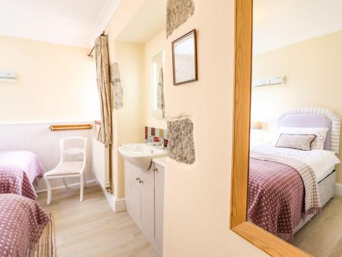 Cama o camas de una habitación en Bwthyn Yr Hafod