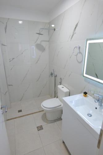 Koupelna v ubytování Hotel Vathi