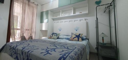 Giường trong phòng chung tại Appartamento Giada 3