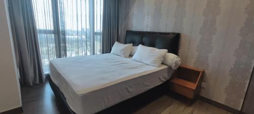 Cama o camas de una habitación en BRANZ BSD Prime Location - BSD Central Business District & ICE BSD