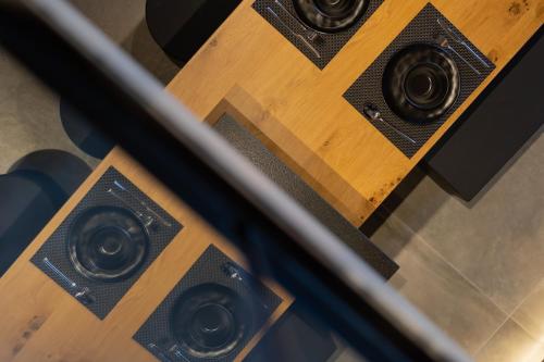an overhead view of three speakers on a table at Spa Villas Nafpaktos in Nafpaktos