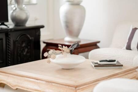 a table with a bowl on top of a table at Modern 2BR Apt in Sandweiler with Terrace in Sandweiler
