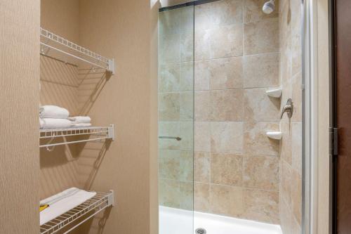 a bathroom with a shower and a walk in shower at Best Western Plus French Lick in French Lick