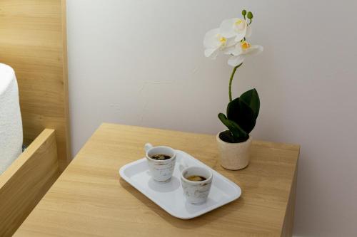 Estia Suitesにあるコーヒーまたはお茶
