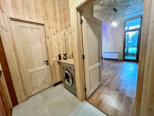 a laundry room with a washing machine in it at Milenium magic villa on Sevan beach in Sevan