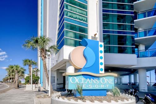 a sign in front of an oceans one vacation resort at Stunning Oceanfront King Suite on 18th Floor Centrally Located in Myrtle Beach