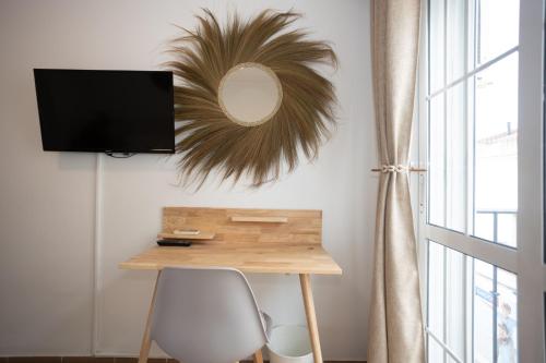 TV a/nebo společenská místnost v ubytování Naim Guest House Nerja
