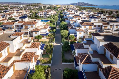 an aerial view of houses in a suburb at Bajo con porche en primera línea En Vera, Almeria in Vera