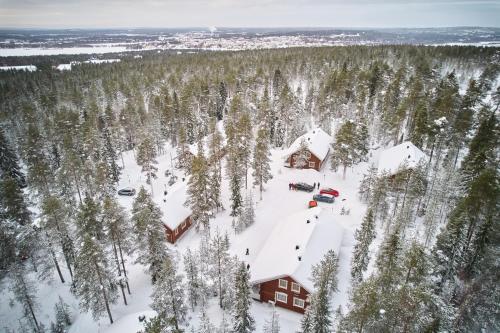 an aerial view of a cabin in the snow at Villa Peippo in Rovaniemi