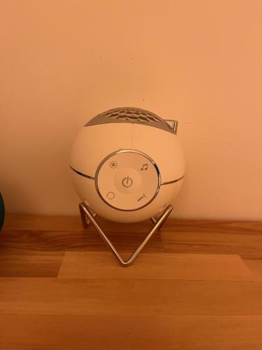 a toaster sitting on top of a wooden floor at FeWo Parkblick HH Schanze in Hamburg