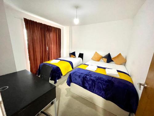 Säng eller sängar i ett rum på London 2Bedrooms 2Bathrooms, Balcony, Parking, Lovely South Woodford
