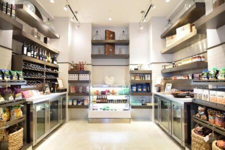 a large grocery store aisle with a lot of products at The Palms, Ocean View Studio Located at Ritz Carlton - Key Biscayne in Miami