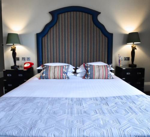 Katil atau katil-katil dalam bilik di The Rutland Hotel & Apartments