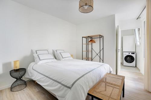 Katil atau katil-katil dalam bilik di La Résidence Alpha Viroflay 202 - 1 chambre - 2 pers