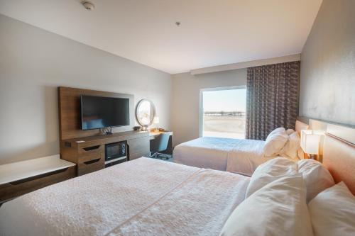 Ένα ή περισσότερα κρεβάτια σε δωμάτιο στο Hampton Inn & Suites Abilene I-20