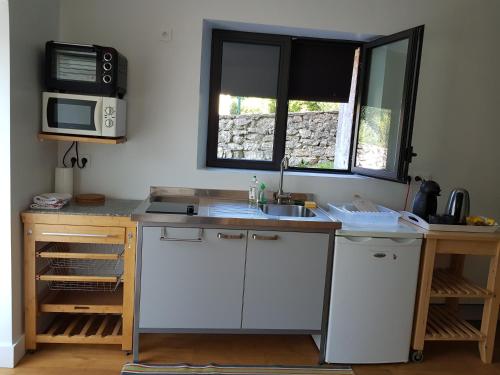 Photo de la galerie de l'établissement Agréable studio proche lac avec terrasse, à La Balmette