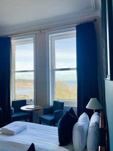 Postel nebo postele na pokoji v ubytování Weston Hotel