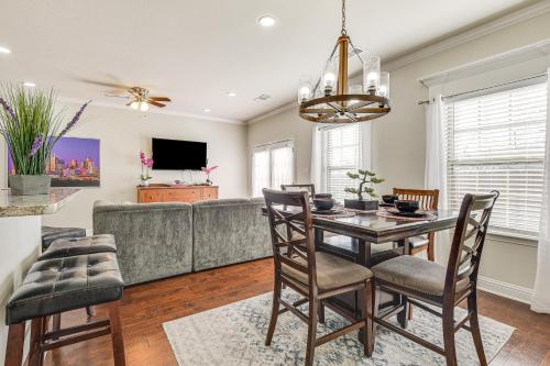 a dining room with a table and a couch at Family-Friendly FIFA World Cup Home Base! in Grand Prairie