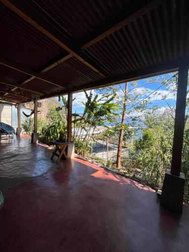 a large patio with a view of the ocean at ELENA'S HOME STAY in Sololá