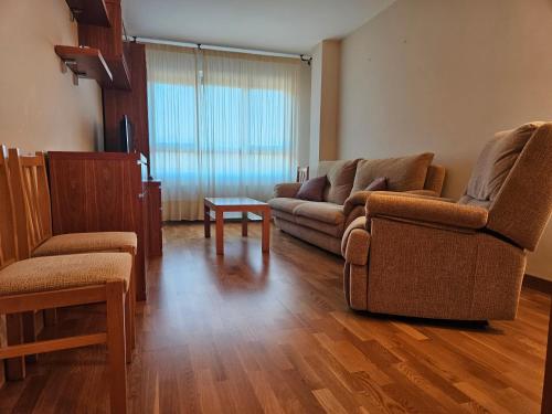 Posezení v ubytování 22A02 Moderno apto Arriondas