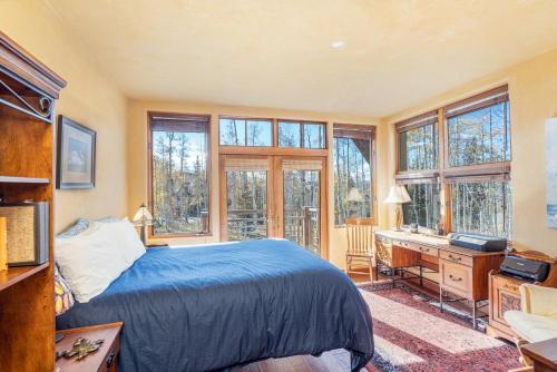 En eller flere senge i et værelse på Gorgeous Granita Ski in-Ski out