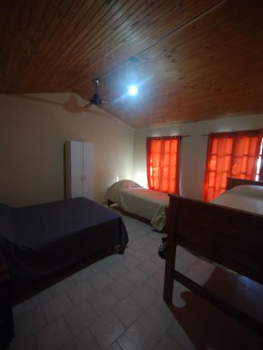 Tempat tidur dalam kamar di Departamento en Chos Malal