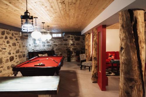 Postel nebo postele na pokoji v ubytování Auberge Incroyable