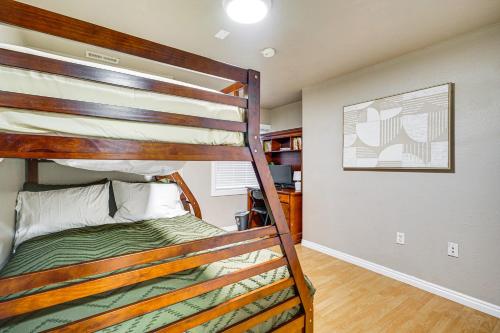 a bedroom with a bunk bed in a room at Pet-Friendly Utah Apartment 2 Mi to Amphitheatre in West Valley City