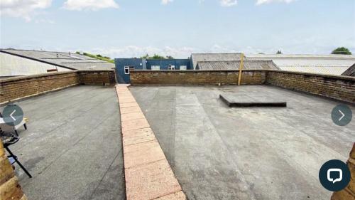 a view of a roof of a building at 4 bedroom property close to the Harry Potter studio and Watford junction in Leavesden Green