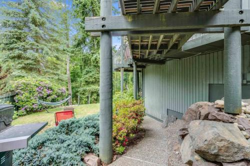 a porch with a bench and a swing at Adorable new studio with free parking and WiFi in Federal Way