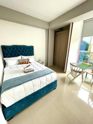 Giường trong phòng chung tại BRR LIMONAR - Nuevo, Cómodo y hermoso aparta estudio 301