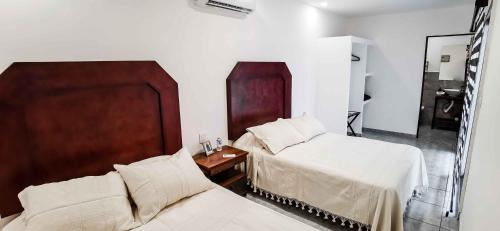 Postel nebo postele na pokoji v ubytování Vagón Resort