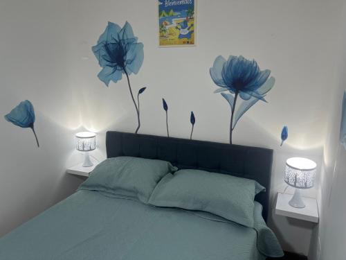 Postel nebo postele na pokoji v ubytování San Miguel, lindo depa, 3 camas, internet y cable