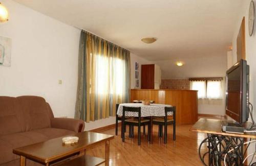 Apartments by the sea Banjol, Rab - 22362