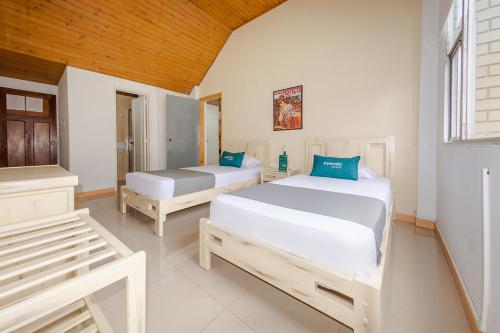 Hotel Ana Carolinaにあるベッド