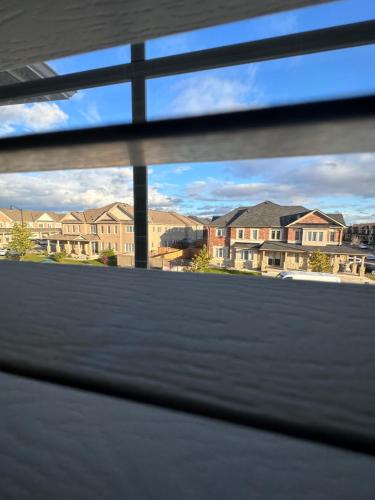 a view from a window of a building at Golden Spring Beautiful home in Brampton