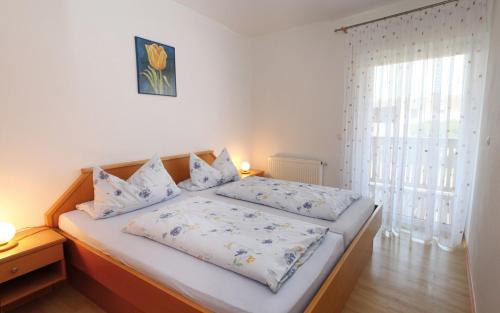 Ένα ή περισσότερα κρεβάτια σε δωμάτιο στο Appartement Werner Hauptenbuchner