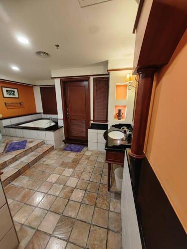 a large bathroom with a sink and a toilet at Port Dickson Teluk Kemang Pantai Tanjung Gemok by 3SIBS in Port Dickson