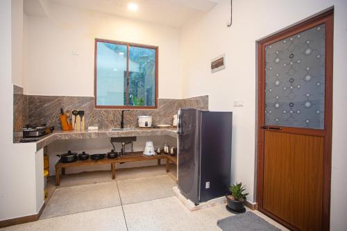 Una cocina o zona de cocina en D2 Villa Unawatuna