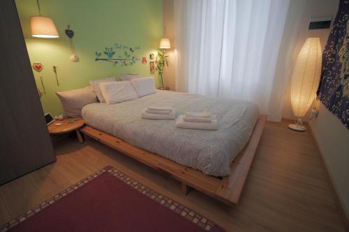 Krevet ili kreveti u jedinici u okviru objekta Itiseasy Palermo 1 e 2 Private Apartments