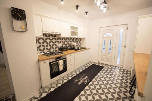 Η κουζίνα ή μικρή κουζίνα στο RITM Apartament
