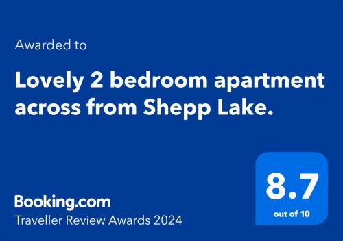 a blue sign with the words luxury bedroom apartment across from sherrop lake at Lovely 2 BR Spa apartment, Opposite Shepp Lake in Shepparton