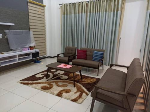 Гостиная зона в MELUR HOMESTAY
