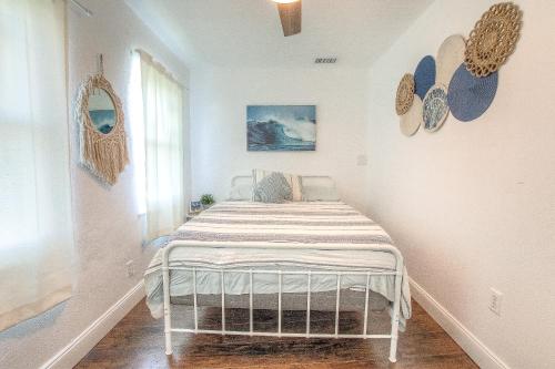 Ένα ή περισσότερα κρεβάτια σε δωμάτιο στο Daytona Shores Inn and Suites