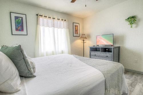 Ένα ή περισσότερα κρεβάτια σε δωμάτιο στο Daytona Shores Inn and Suites