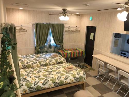 Una cama o camas en una habitación de Chulashima Heartland