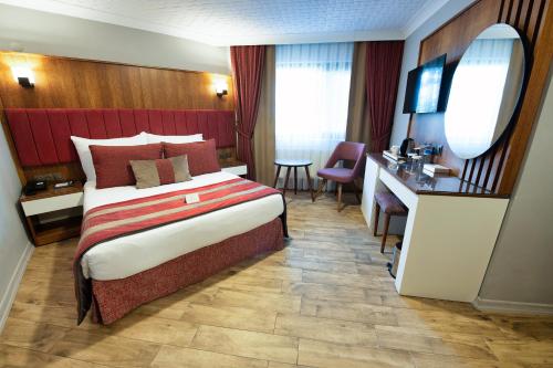 Katil atau katil-katil dalam bilik di Vela Verde Hotel & SPA