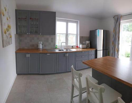 Kuchyňa alebo kuchynka v ubytovaní Vila Dubravka - schön und komfortabel inmitten von Olivenbäumen und Weinbergen mit Whirlpool