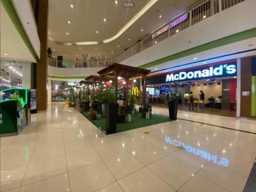 a shopping mall with at San Lorenzo Place in Manila